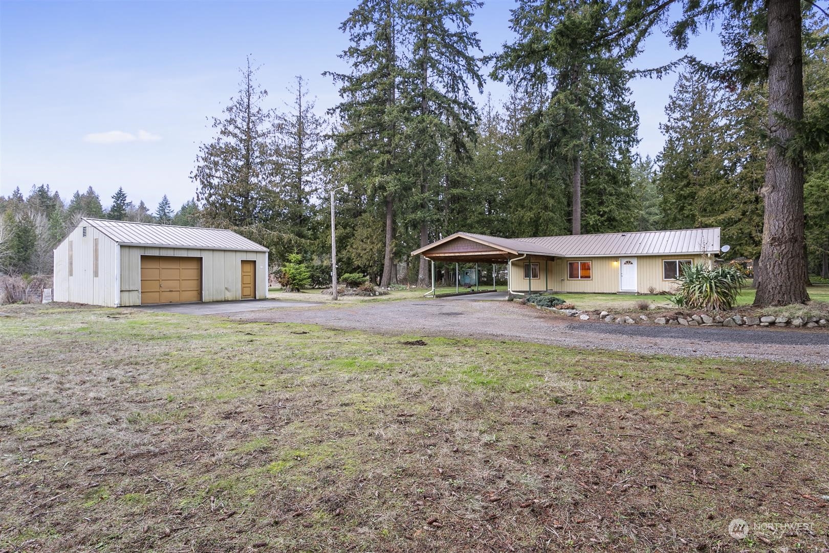 3397 Cedarville Road Bellingham, WA 98226 - Photo 29 of 38 a front view of house with yard and trees in the background