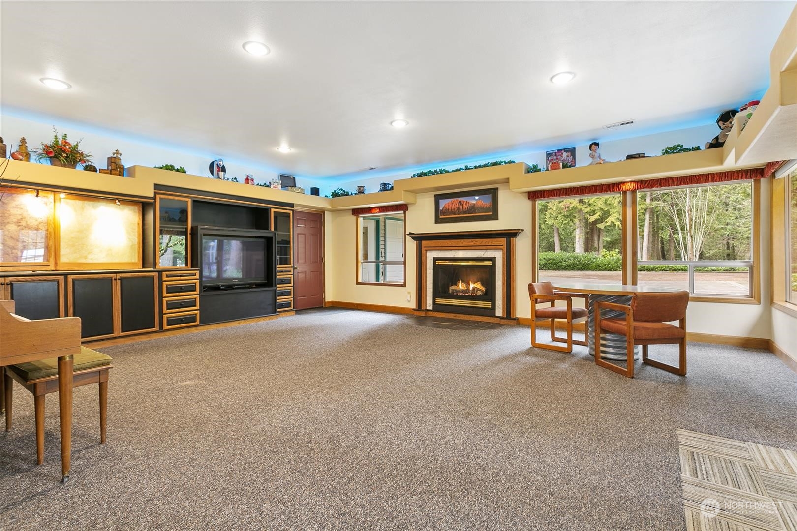 3397 Cedarville Road Bellingham, WA 98226 - Photo 3 of 38 a living room with furniture a fireplace and a flat screen tv