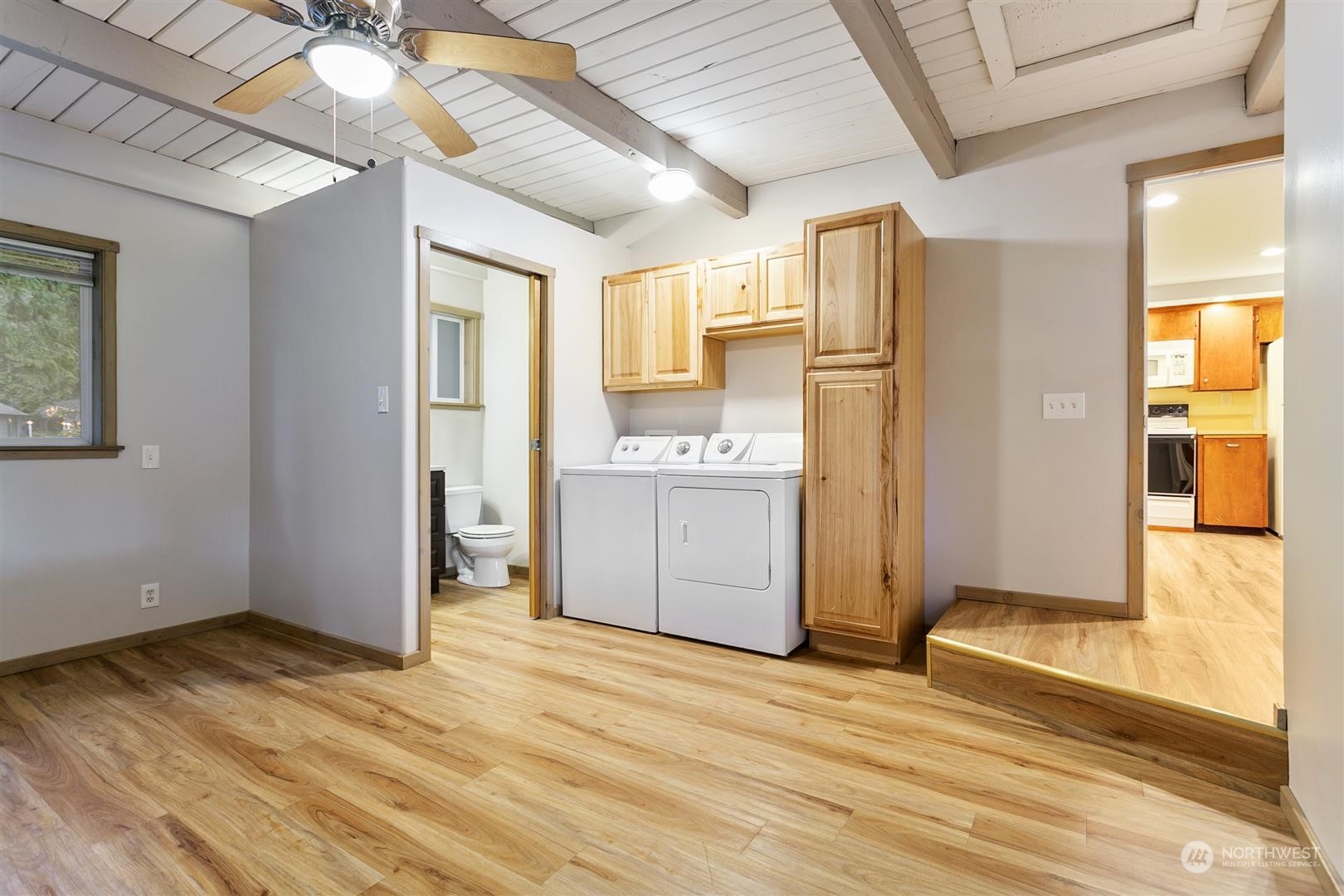 3397 Cedarville Road Bellingham, WA 98226 - Photo 34 of 38 a view of a kitchen with wooden floor and a refrigerator