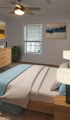 a bathroom with a sink a toilet and a large mirror