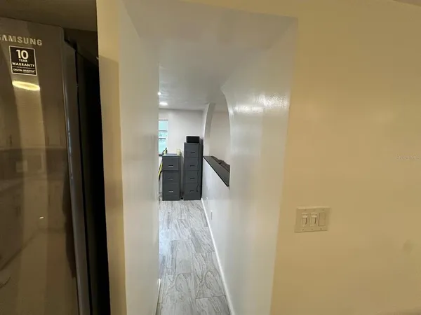 an aerial view of a house with a garden