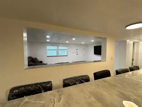 a bathroom with a sink toilet and mirror