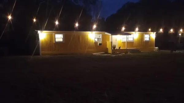 a vase of flowers sitting on a table