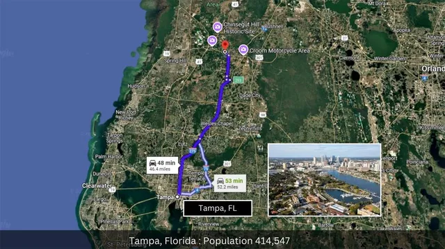 a view of hallway with wooden floor