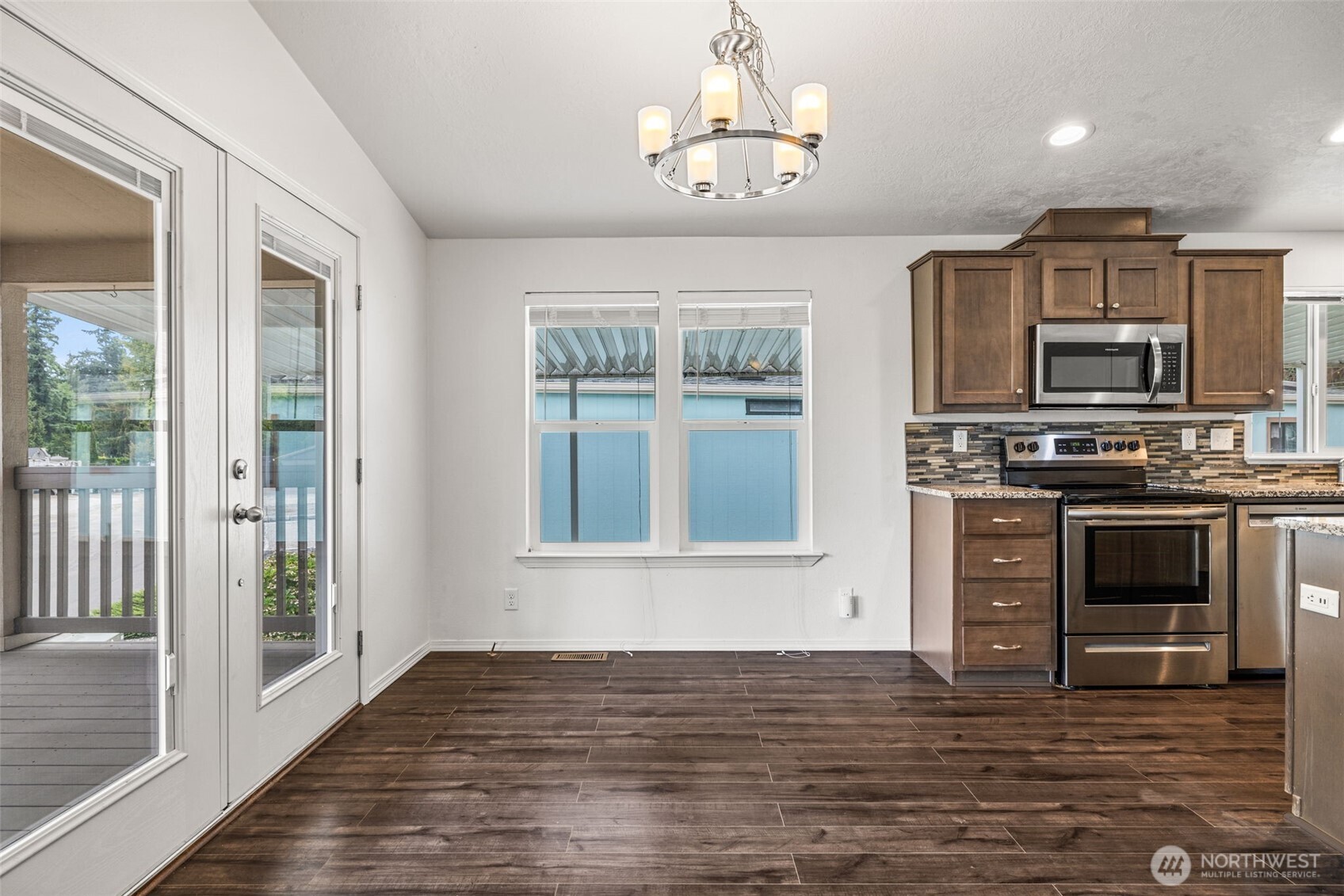 2101 South 324th Street, Unit 14 Federal Way, WA 98003 - Photo 11 of 38 a view of kitchen with stove and microwave