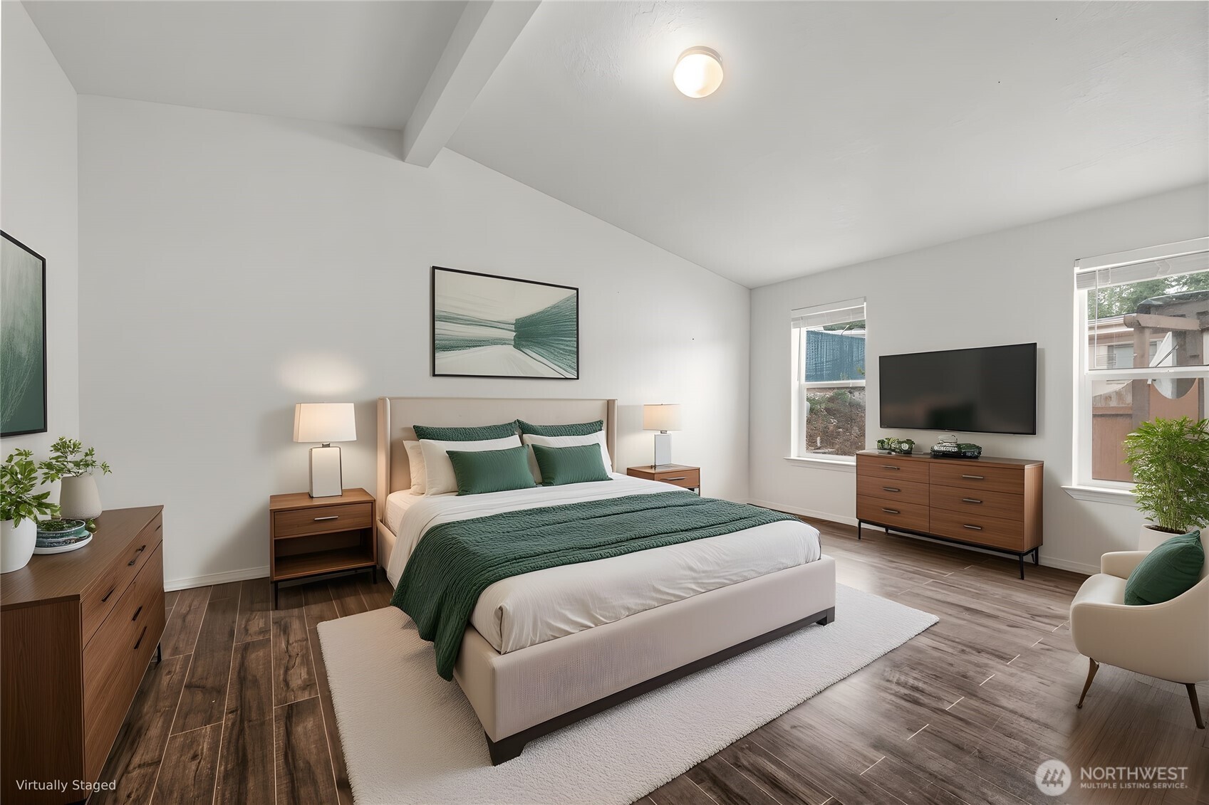 2101 South 324th Street, Unit 14 Federal Way, WA 98003 - Photo 16 of 38 a bedroom with a bed a couch and a flat screen tv