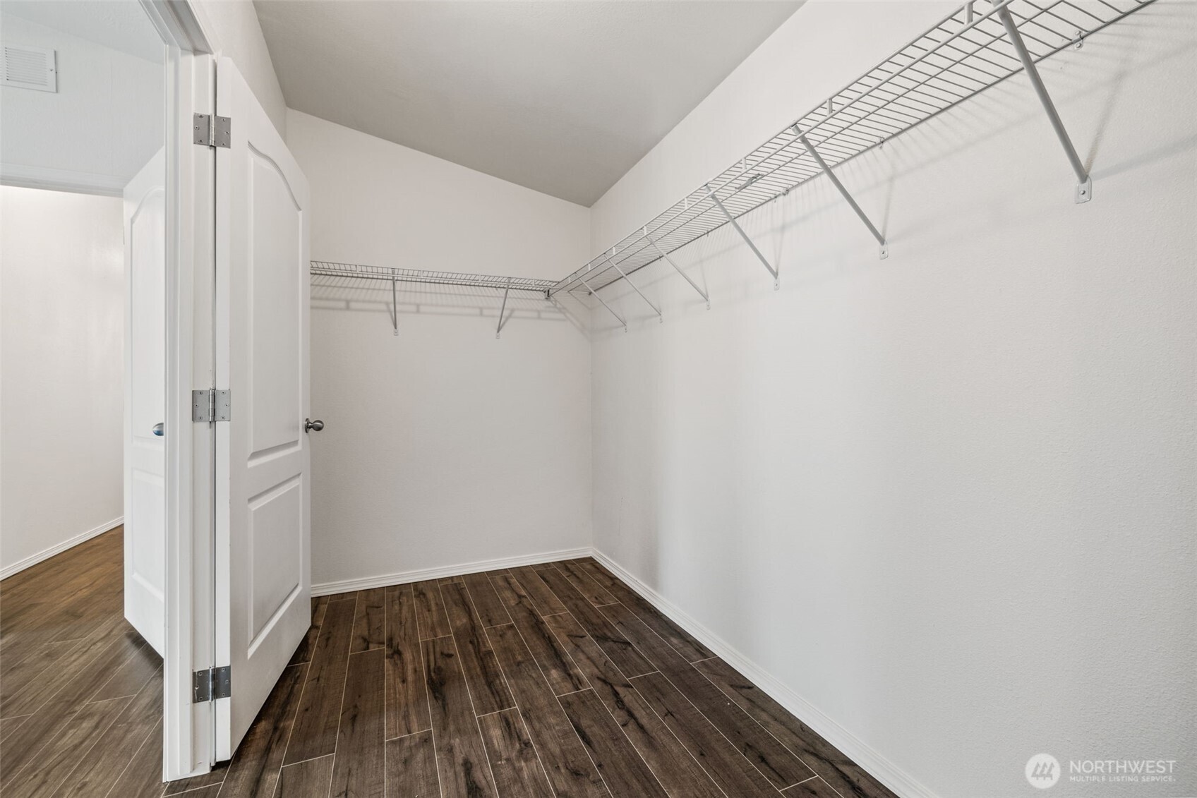 2101 South 324th Street, Unit 14 Federal Way, WA 98003 - Photo 19 of 38 a view of a room with wooden floor