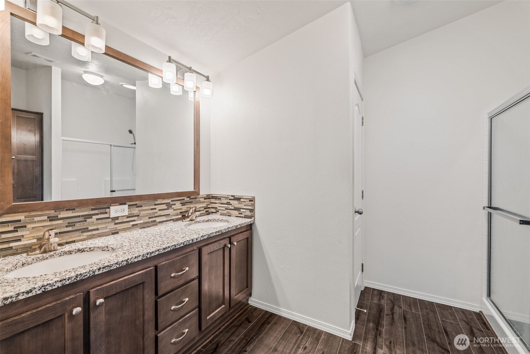2101 South 324th Street, Unit 14 Federal Way, WA 98003 - Photo 20 of 38 a bathroom with a sink and a mirror