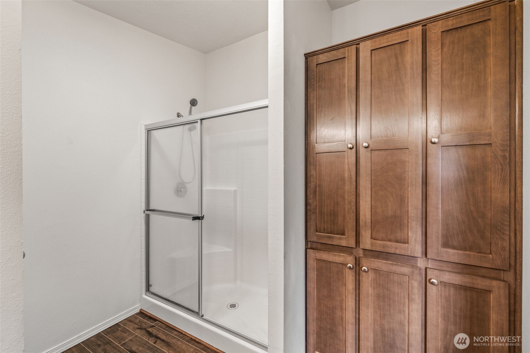 2101 South 324th Street, Unit 14 Federal Way, WA 98003 - Photo 21 of 38 a bathroom with a glass shower door