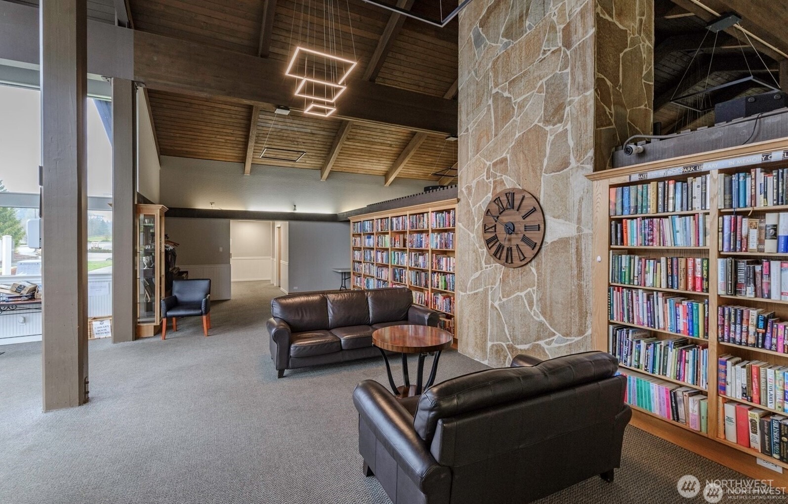 2101 South 324th Street, Unit 14 Federal Way, WA 98003 - Photo 33 of 38 a living room with furniture and a book shelf
