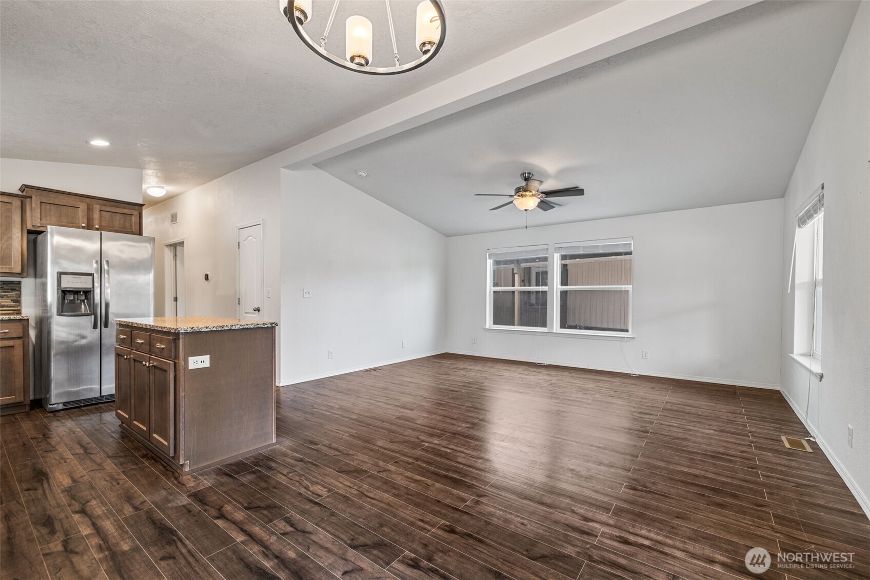 2101 South 324th Street, Unit 14 Federal Way, WA 98003 - Photo 7 of 38 a view of a kitchen with a sink dishwasher and a refrigerator