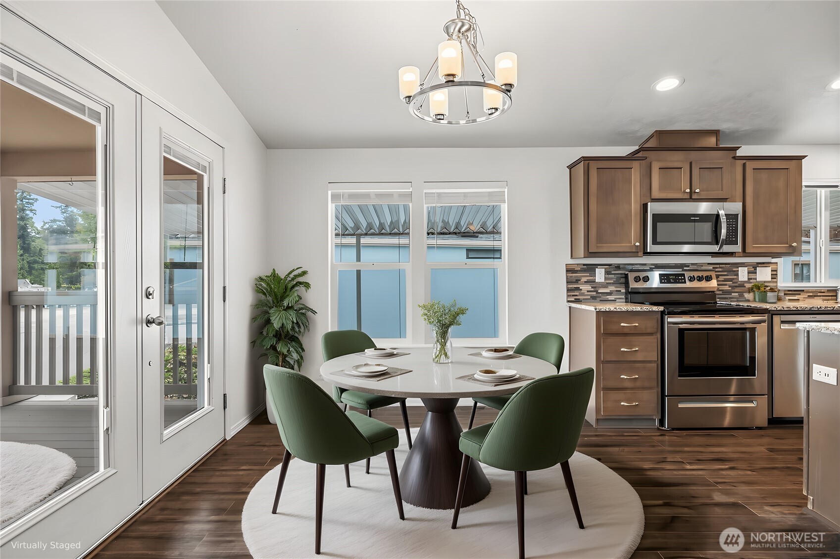 2101 South 324th Street, Unit 14 Federal Way, WA 98003 - Photo 10 of 38 a view of a dining room with furniture window and wooden floor