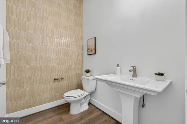 a kitchen with stainless steel appliances granite countertop a stove and a cabinets