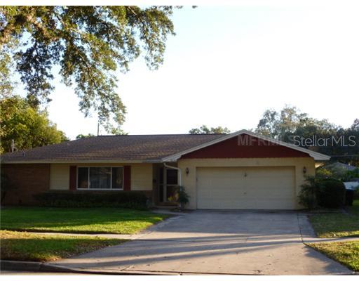 2434 Summerfield Road Winter Park, FL 32792 - Photo 1 of 1 a front view of a house with a yard