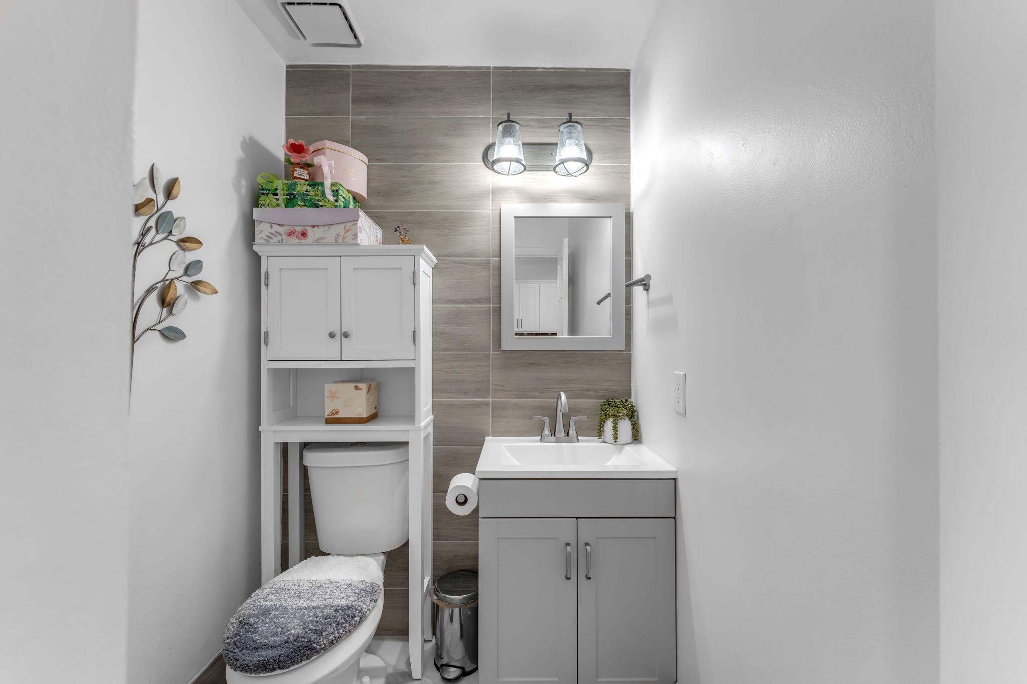 13860 Southwest 102nd Terrace Miami, FL 33186 - Photo 13 of 39 a bathroom with a sink toilet and mirror