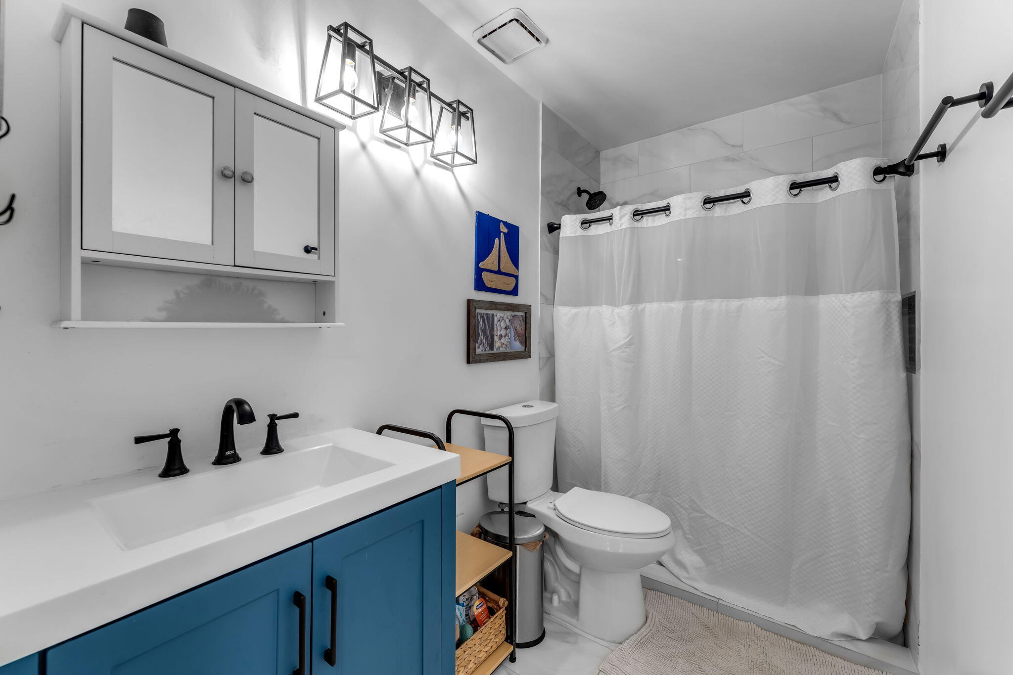 13860 Southwest 102nd Terrace Miami, FL 33186 - Photo 17 of 39 a bathroom with a sink a toilet and shower