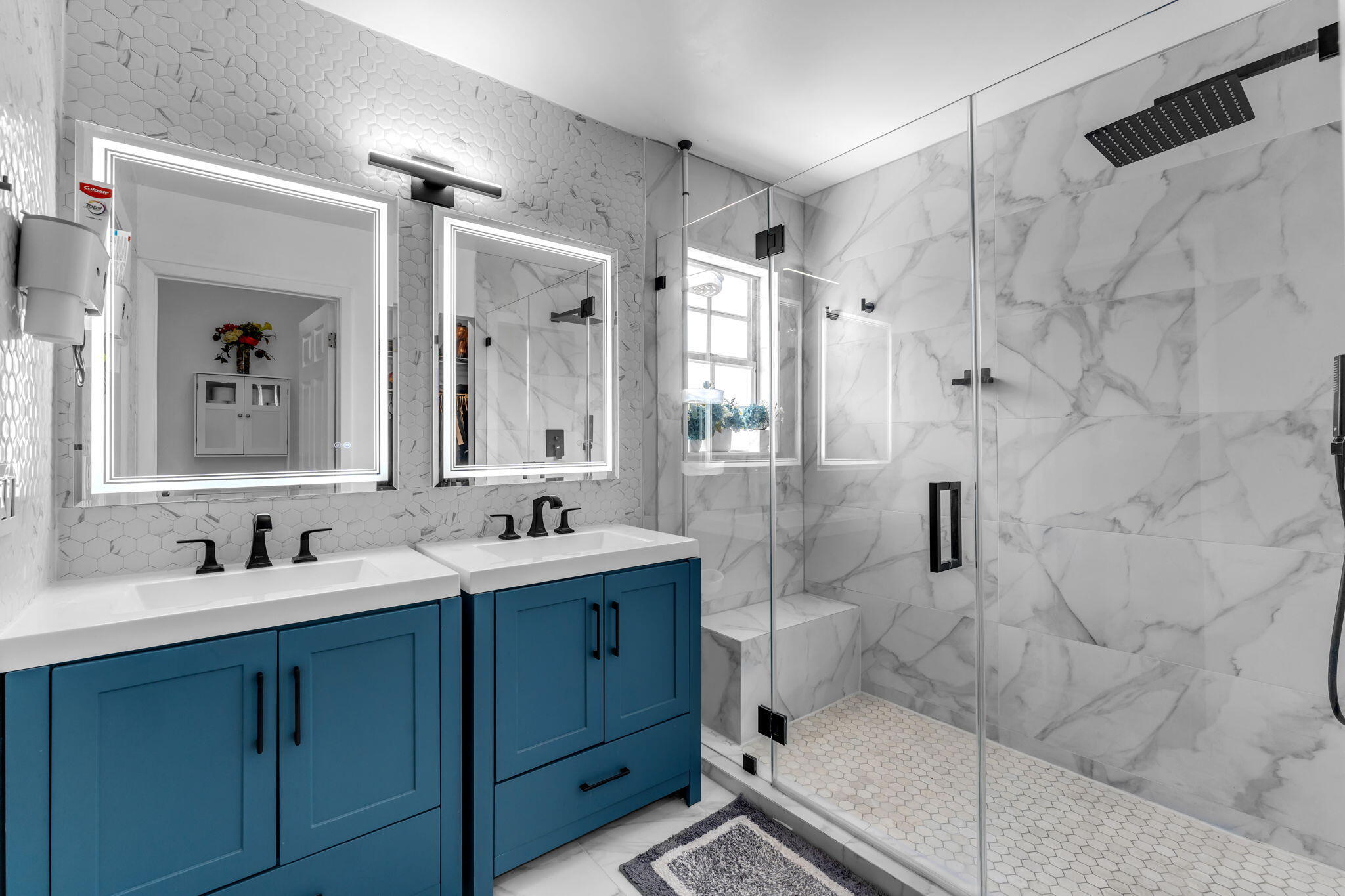 13860 Southwest 102nd Terrace Miami, FL 33186 - Photo 23 of 39 a bathroom with double sink and a mirror