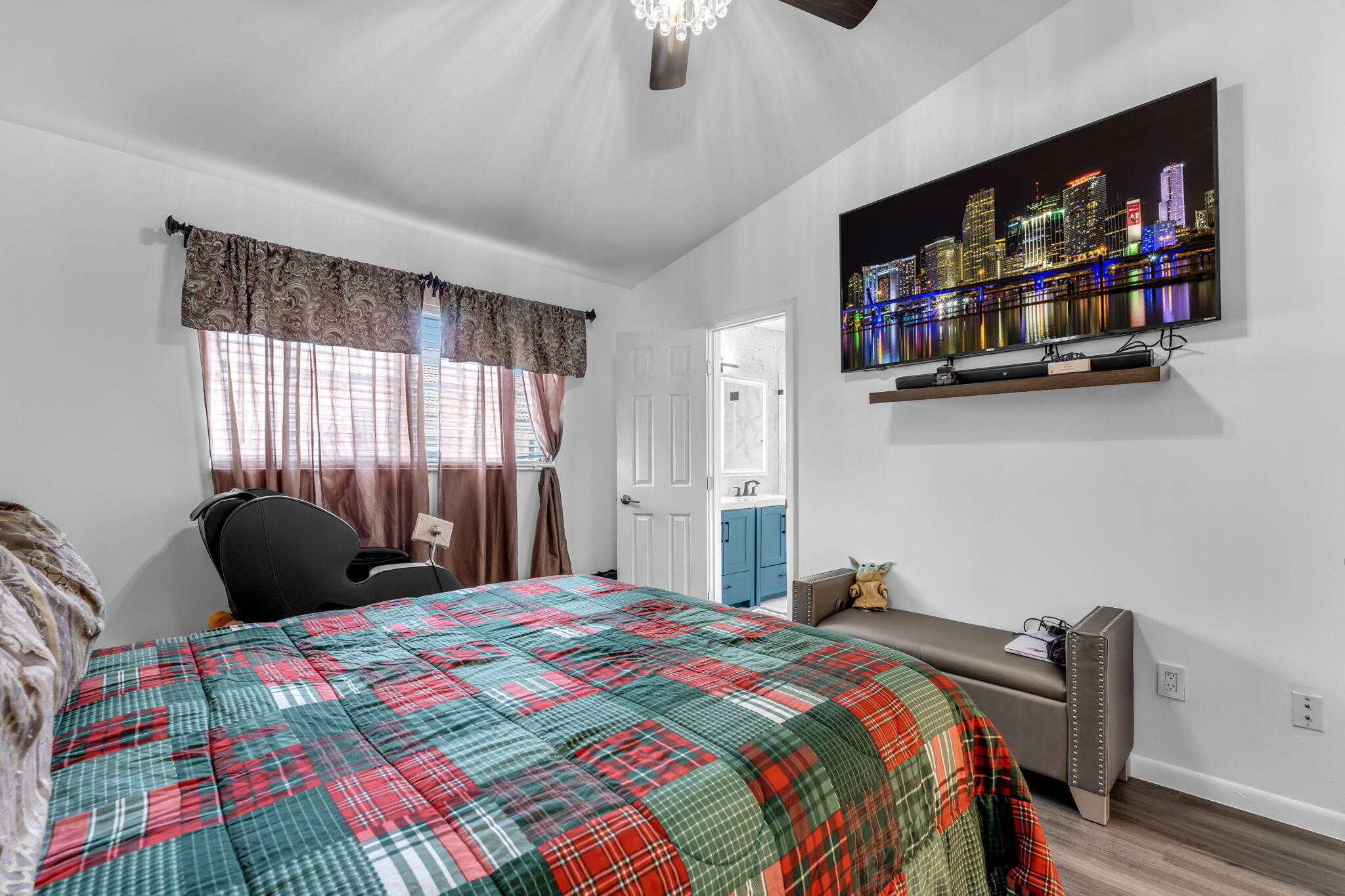 13860 Southwest 102nd Terrace Miami, FL 33186 - Photo 24 of 39 a bedroom with a bed window and wall painting