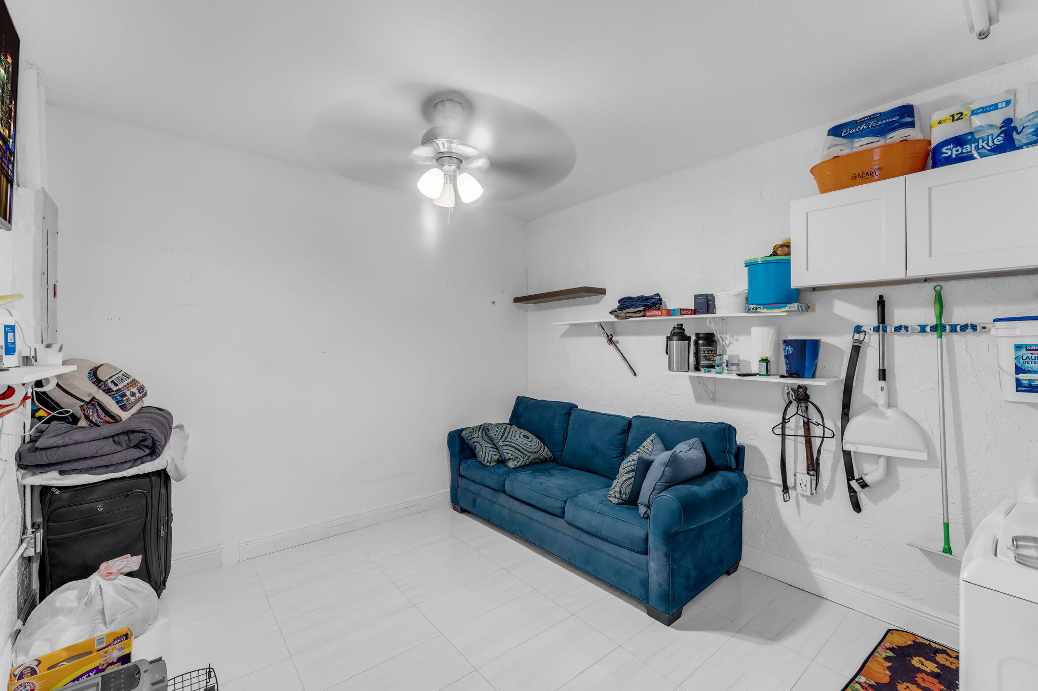 13860 Southwest 102nd Terrace Miami, FL 33186 - Photo 25 of 39 a living room with furniture and a flat screen tv
