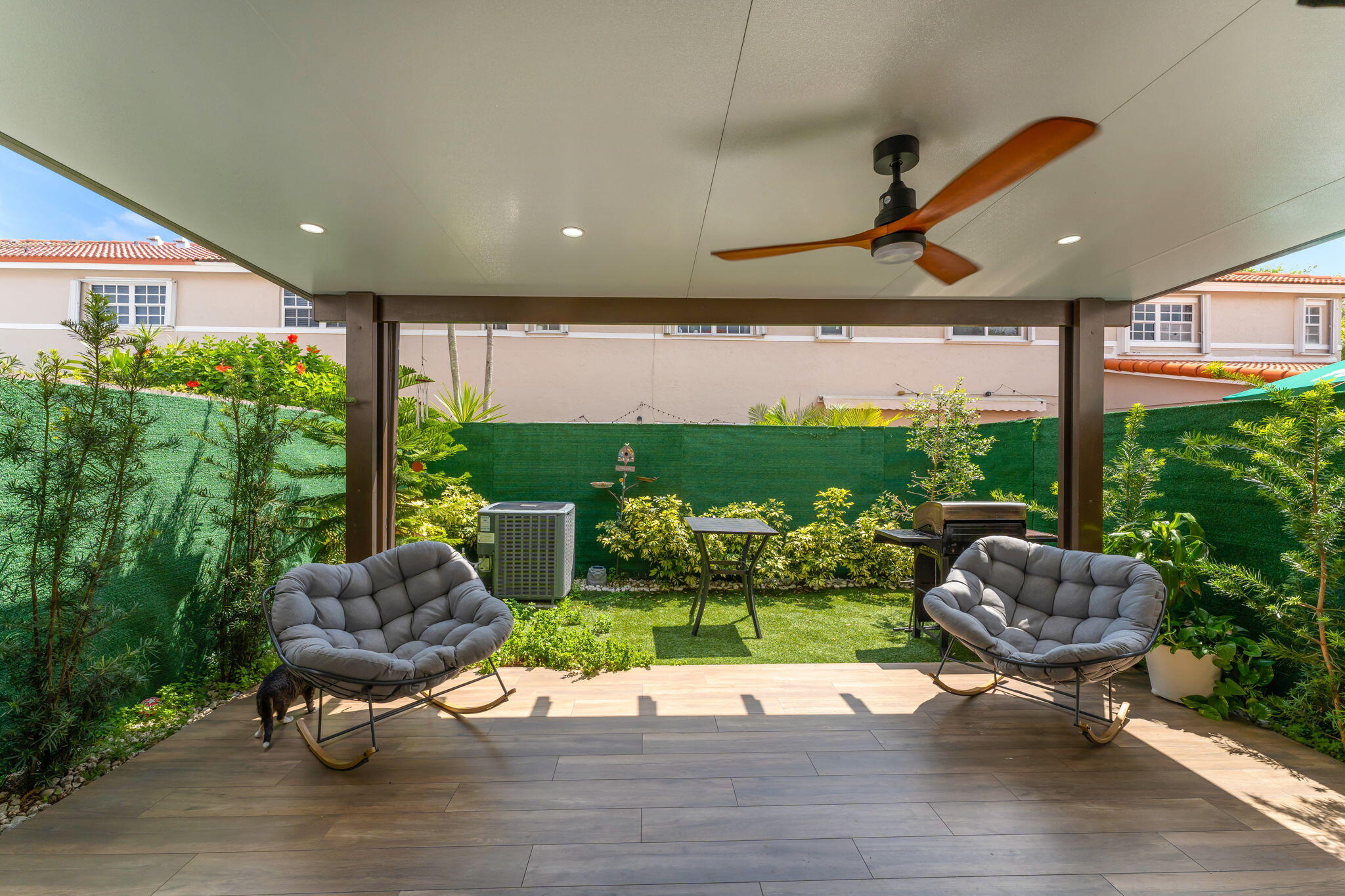 13860 Southwest 102nd Terrace Miami, FL 33186 - Photo 26 of 39 a garden view with a seating space