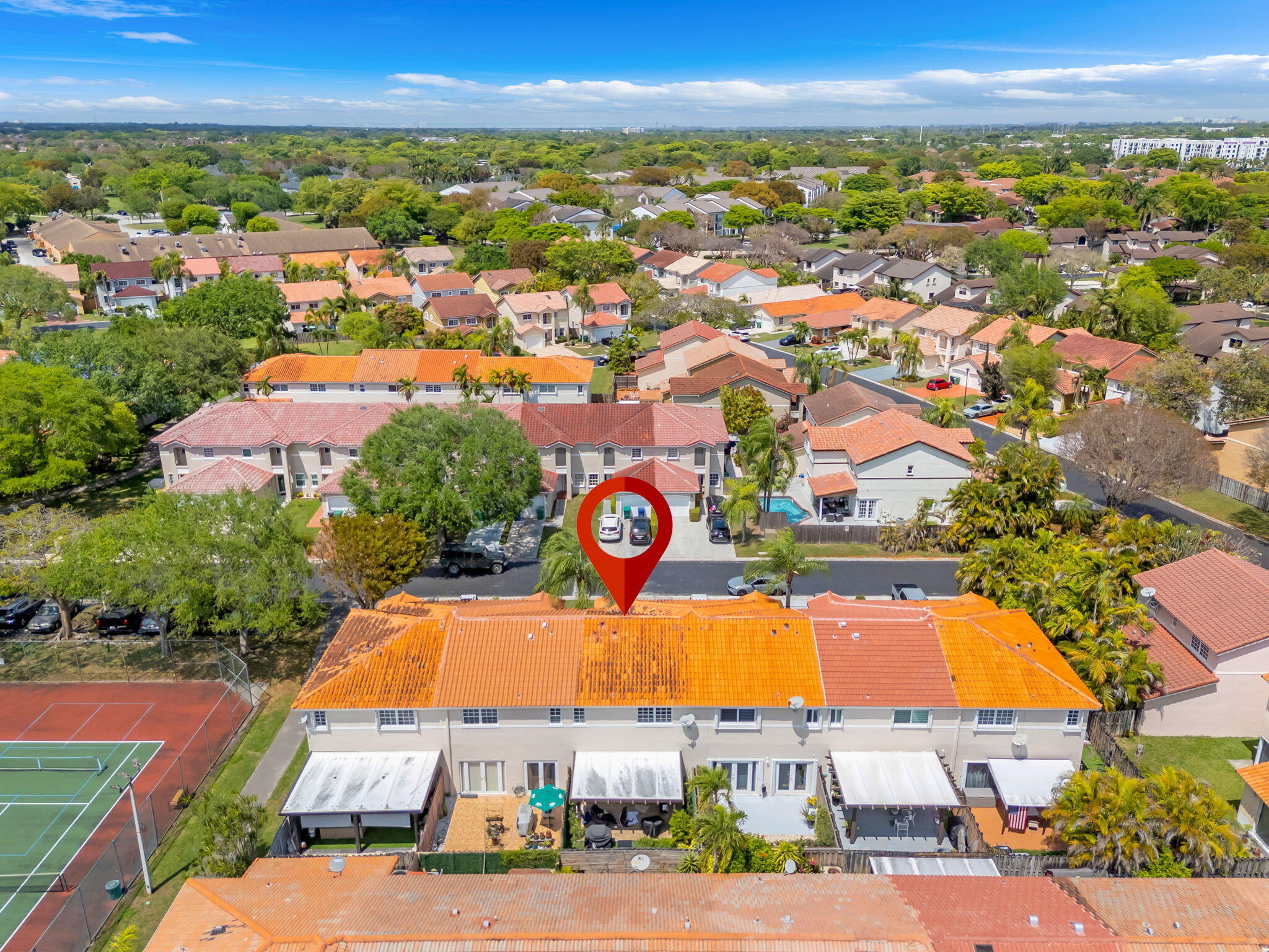 13860 Southwest 102nd Terrace Miami, FL 33186 - Photo 31 of 39 an aerial view of residential houses and outdoor space
