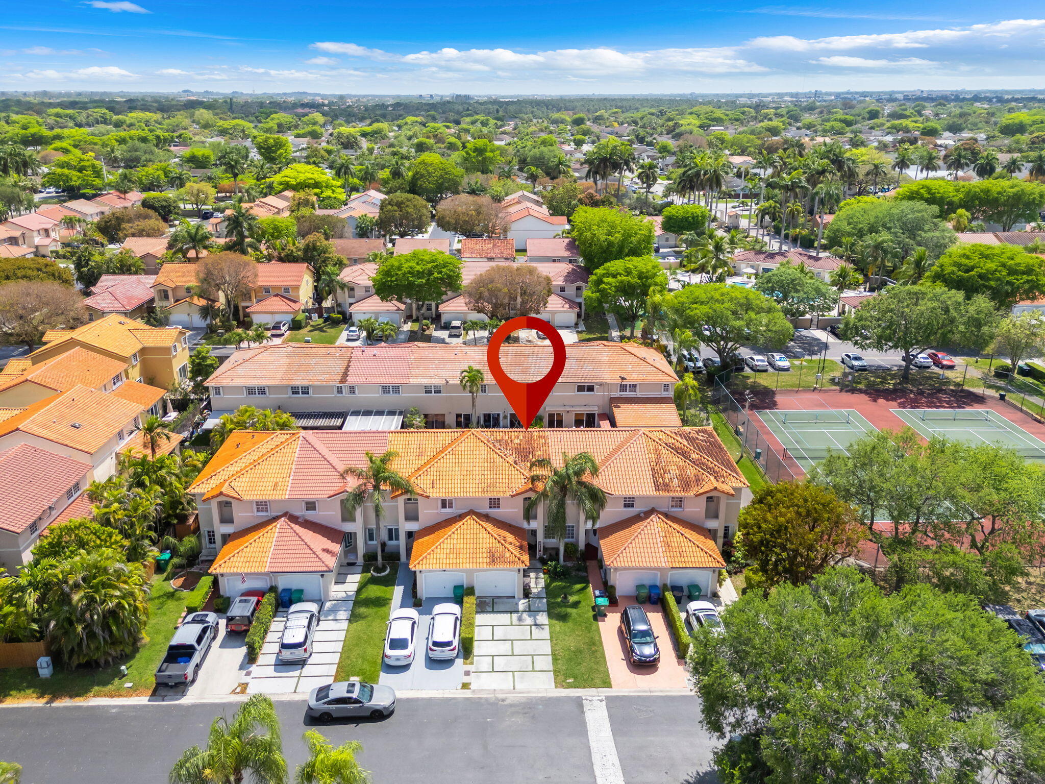 13860 Southwest 102nd Terrace Miami, FL 33186 - Photo 38 of 39 an aerial view of residential houses with outdoor space and parking