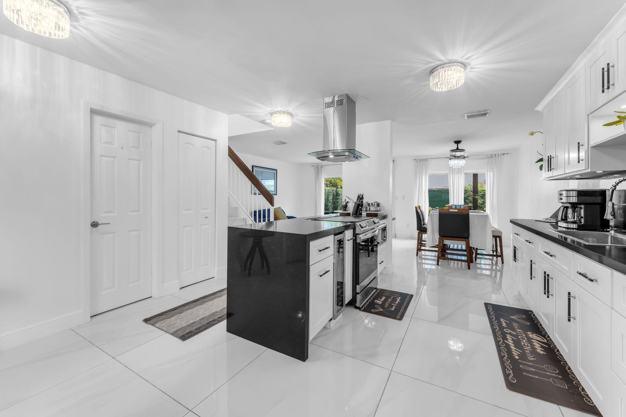 13860 Southwest 102nd Terrace Miami, FL 33186 - Photo 7 of 39 a view of kitchen with furniture and wooden floor
