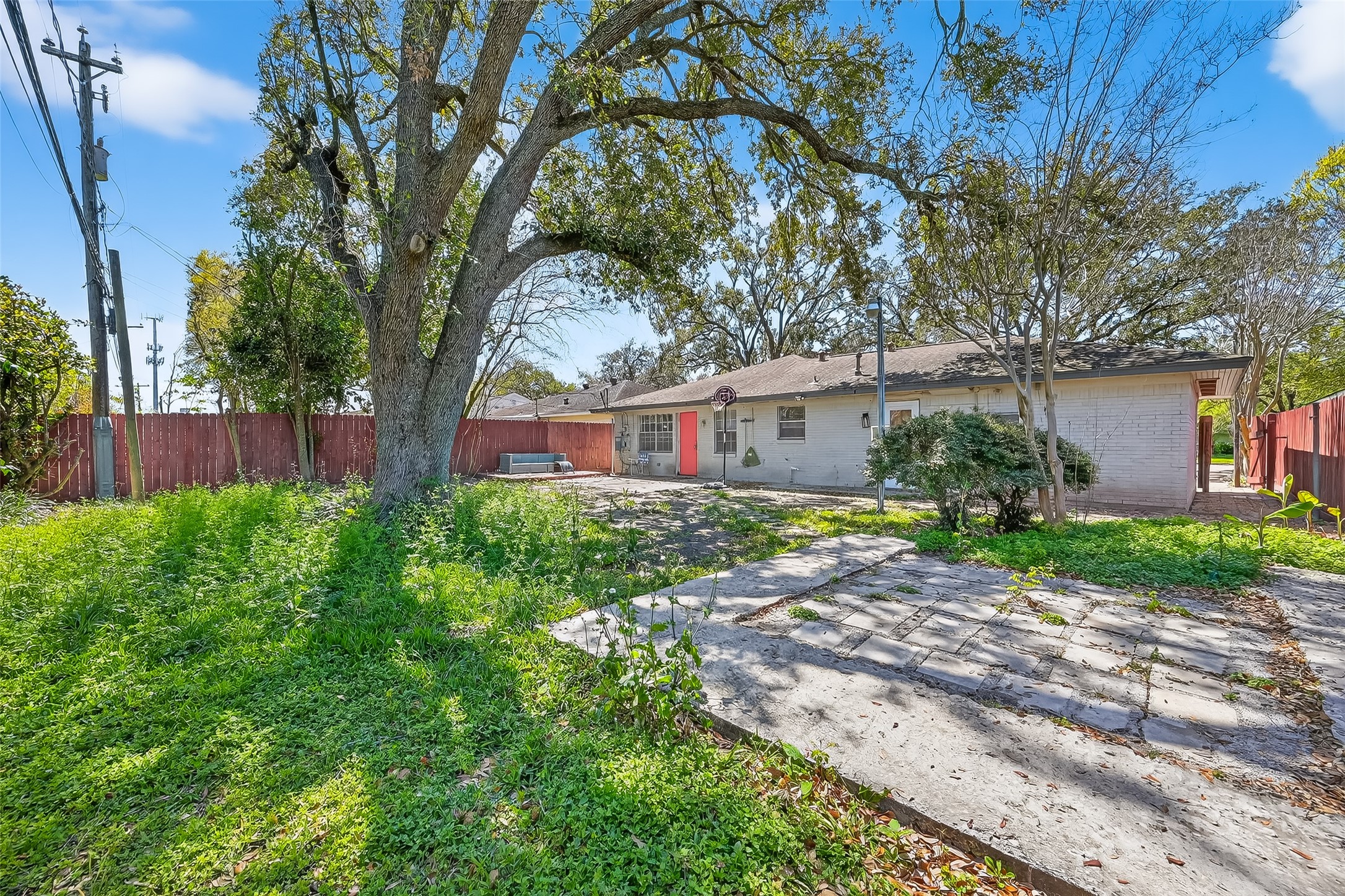12211 Chimney Rock Road Houston, TX 77035 - Photo 25 of 27 a front view of a house with garden
