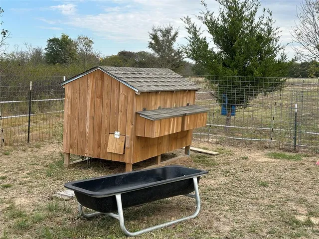 a view of a lake with a yard