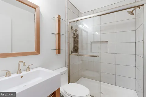 a view of a wooden deck with a patio