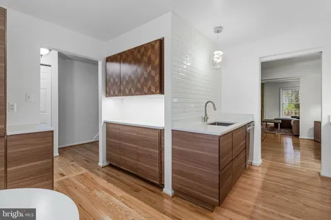 a en suite bathroom with a sink and a mirror