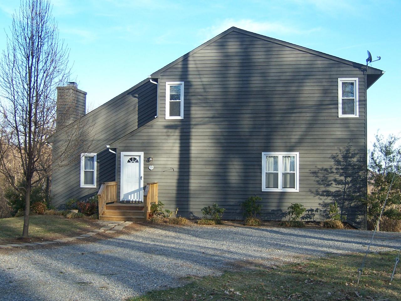 5523 Bore Auger Road Blue Ridge, VA 24064 - Photo 1 of 20 a front view of a house with a yard
