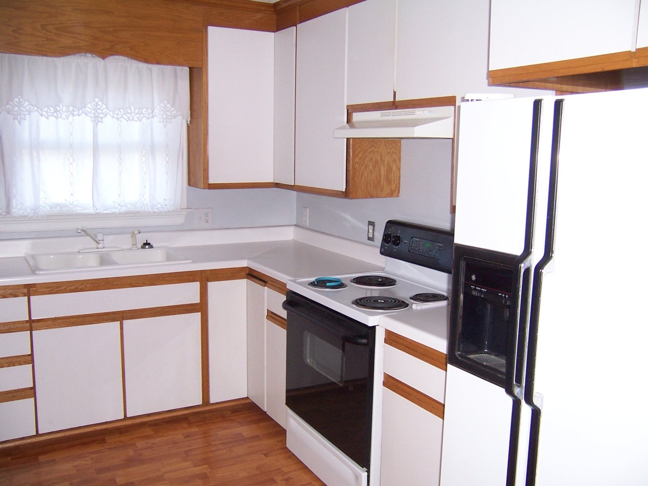 5523 Bore Auger Road Blue Ridge, VA 24064 - Photo 3 of 20 a kitchen with a stove and a white cabinet