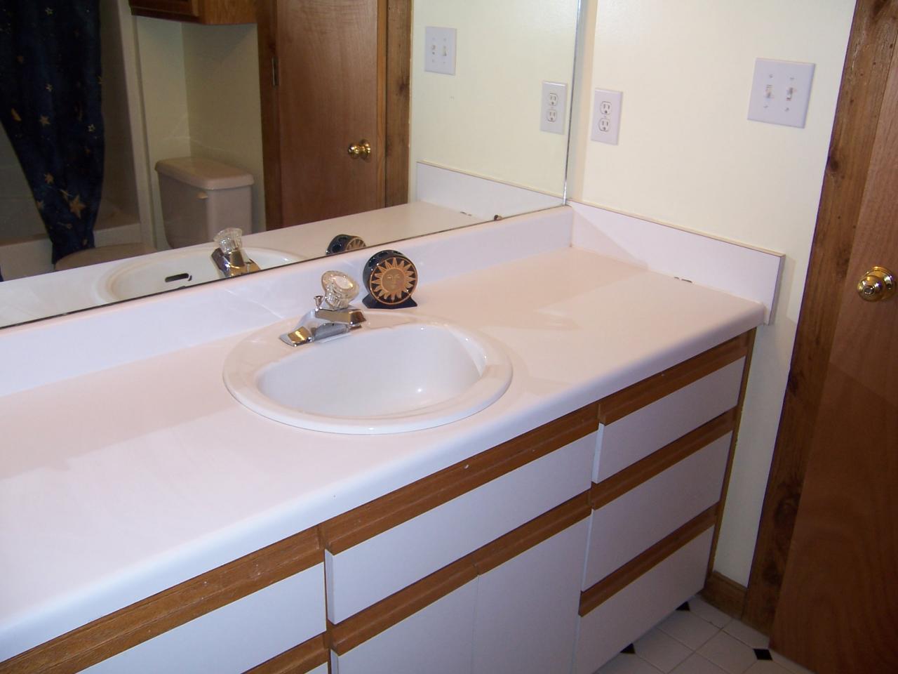 5523 Bore Auger Road Blue Ridge, VA 24064 - Photo 9 of 20 a bathroom with a sink and a mirror