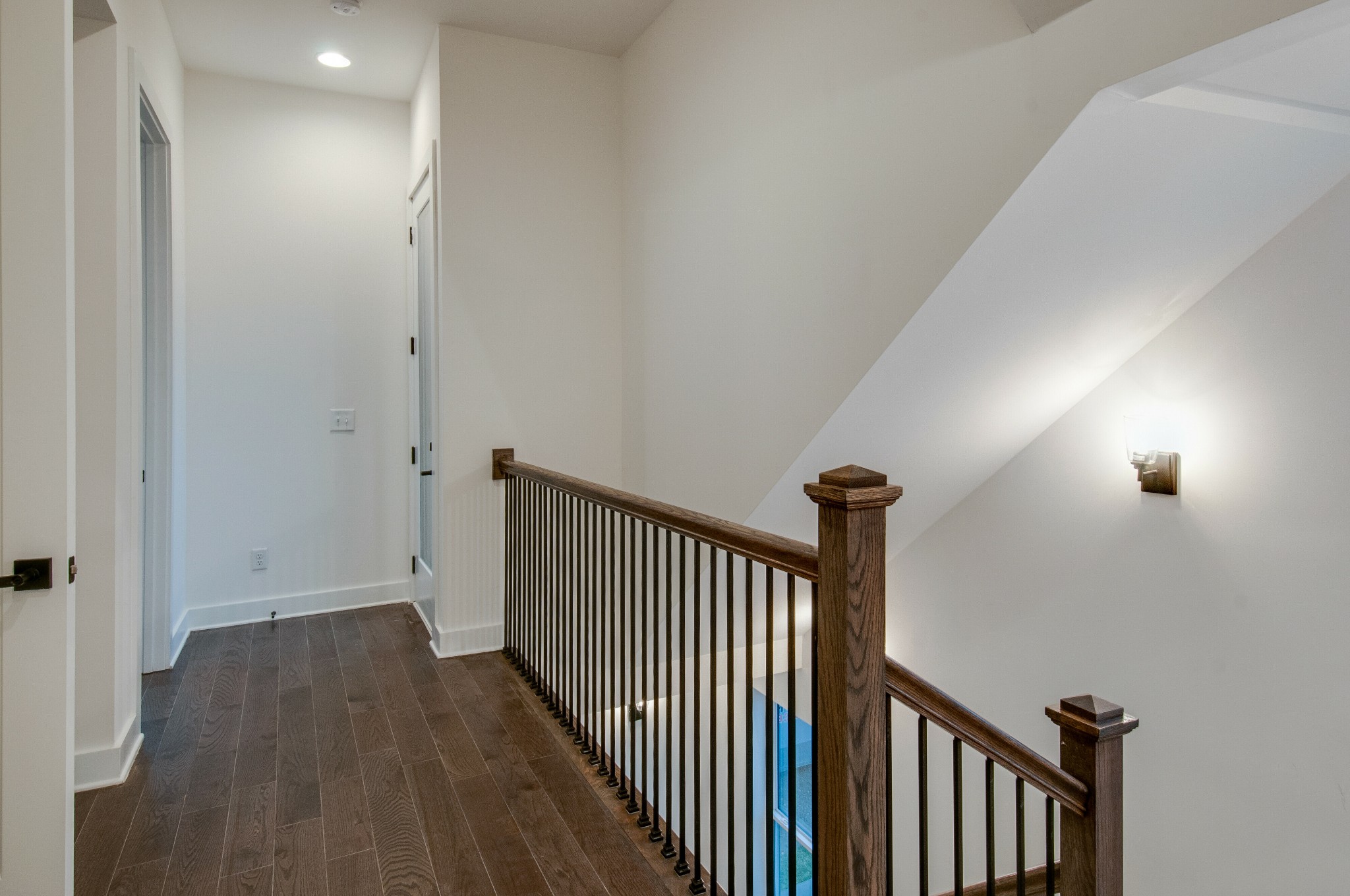 556 Rosedale Avenue, Unit 1 Nashville, TN 37211 - Photo 11 of 33 a view of a hallway with wooden floor and a mirror