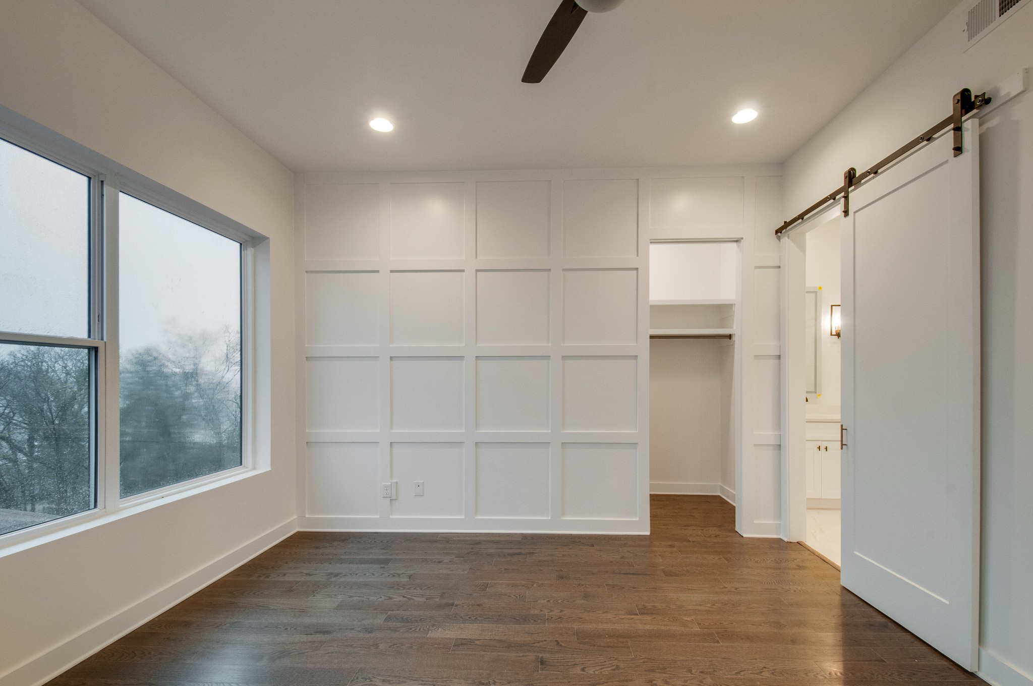 556 Rosedale Avenue, Unit 1 Nashville, TN 37211 - Photo 13 of 33 a view of empty room with wooden floor and window