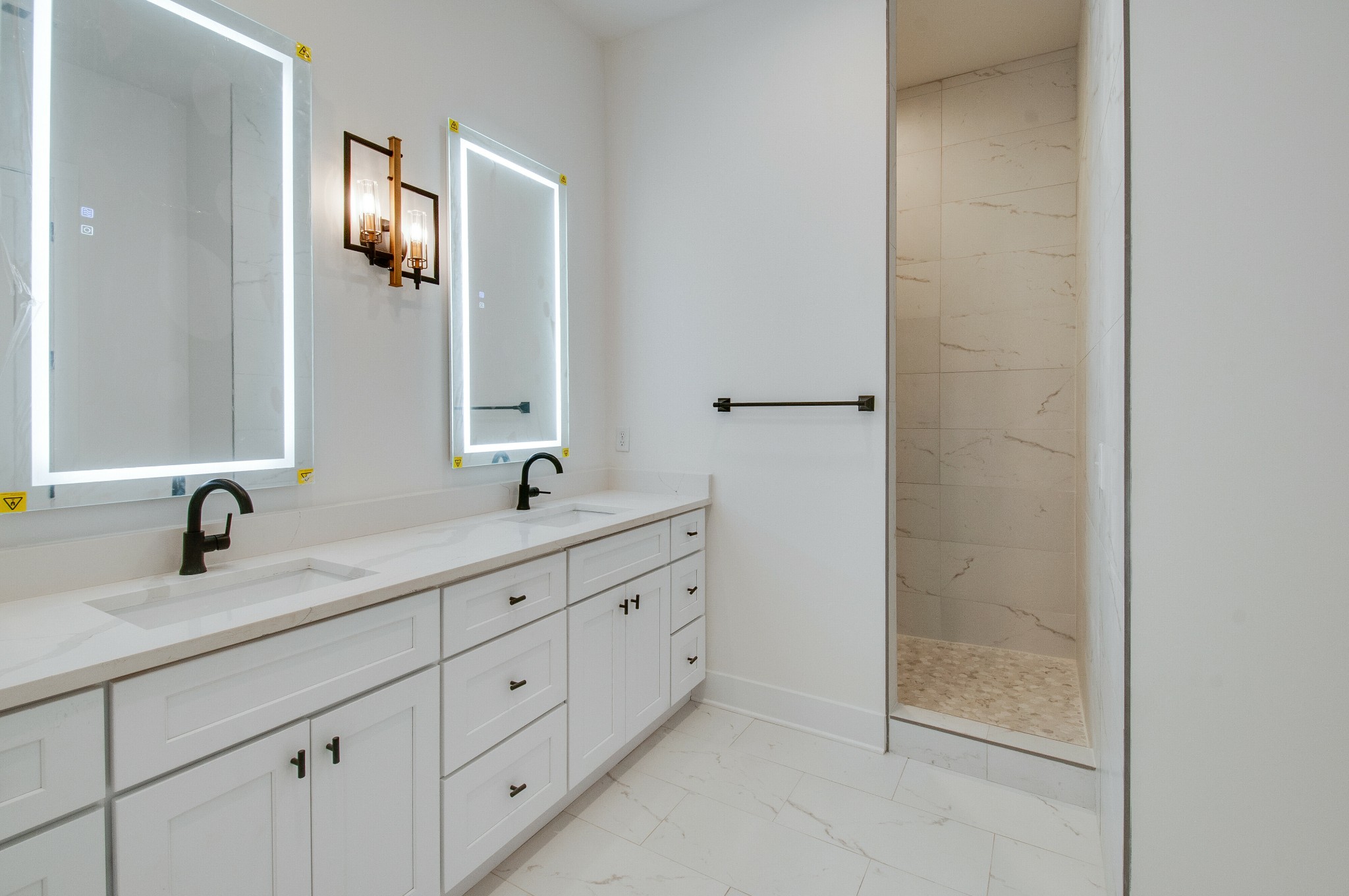 556 Rosedale Avenue, Unit 1 Nashville, TN 37211 - Photo 16 of 33 a bathroom with a double vanity sink and mirror