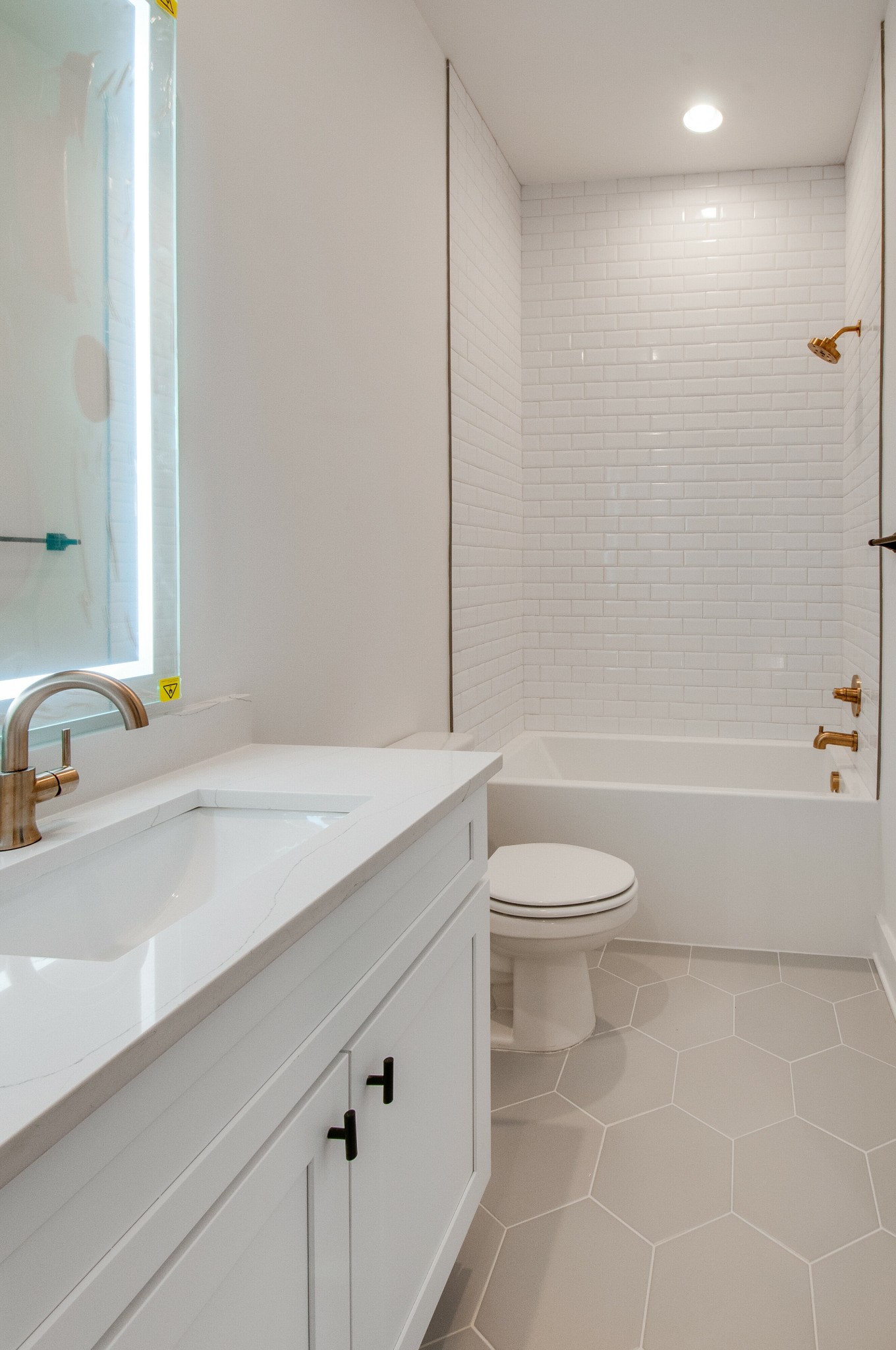 556 Rosedale Avenue, Unit 1 Nashville, TN 37211 - Photo 19 of 33 a bathroom with a sink a toilet and shower