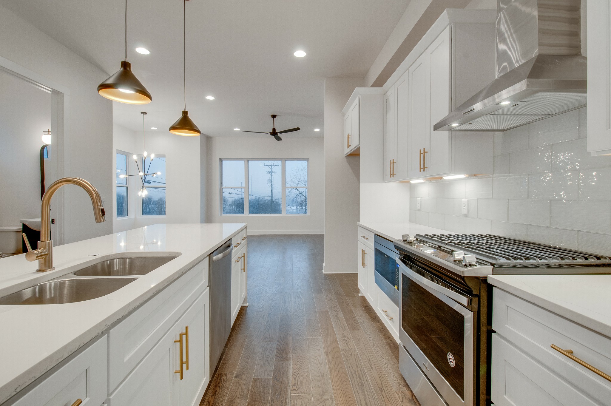 556 Rosedale Avenue, Unit 1 Nashville, TN 37211 - Photo 5 of 33 a kitchen with granite countertop a sink stove and cabinets