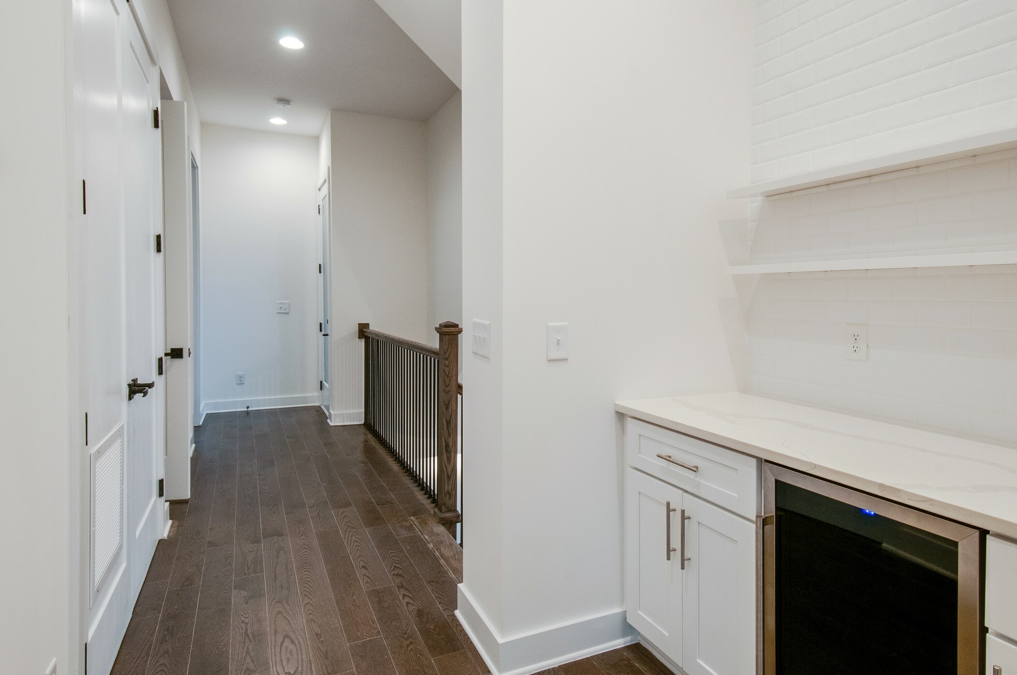 556 Rosedale Avenue, Unit 1 Nashville, TN 37211 - Photo 10 of 33 a view of a hallway with wooden floor and staircase