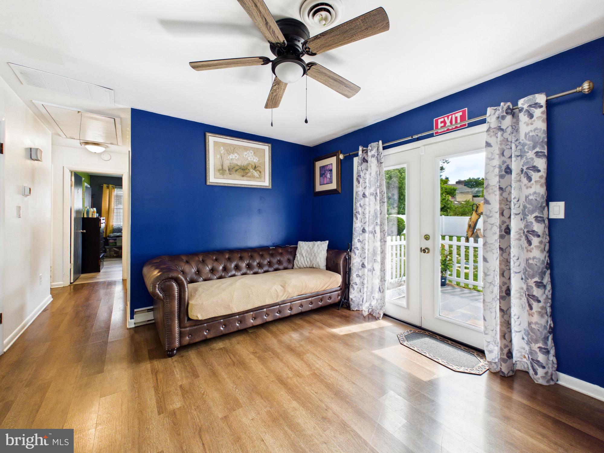 503 Gunby Road Salisbury, MD 21804 - Photo 14 of 36 Charming entryway with bold blue walls.