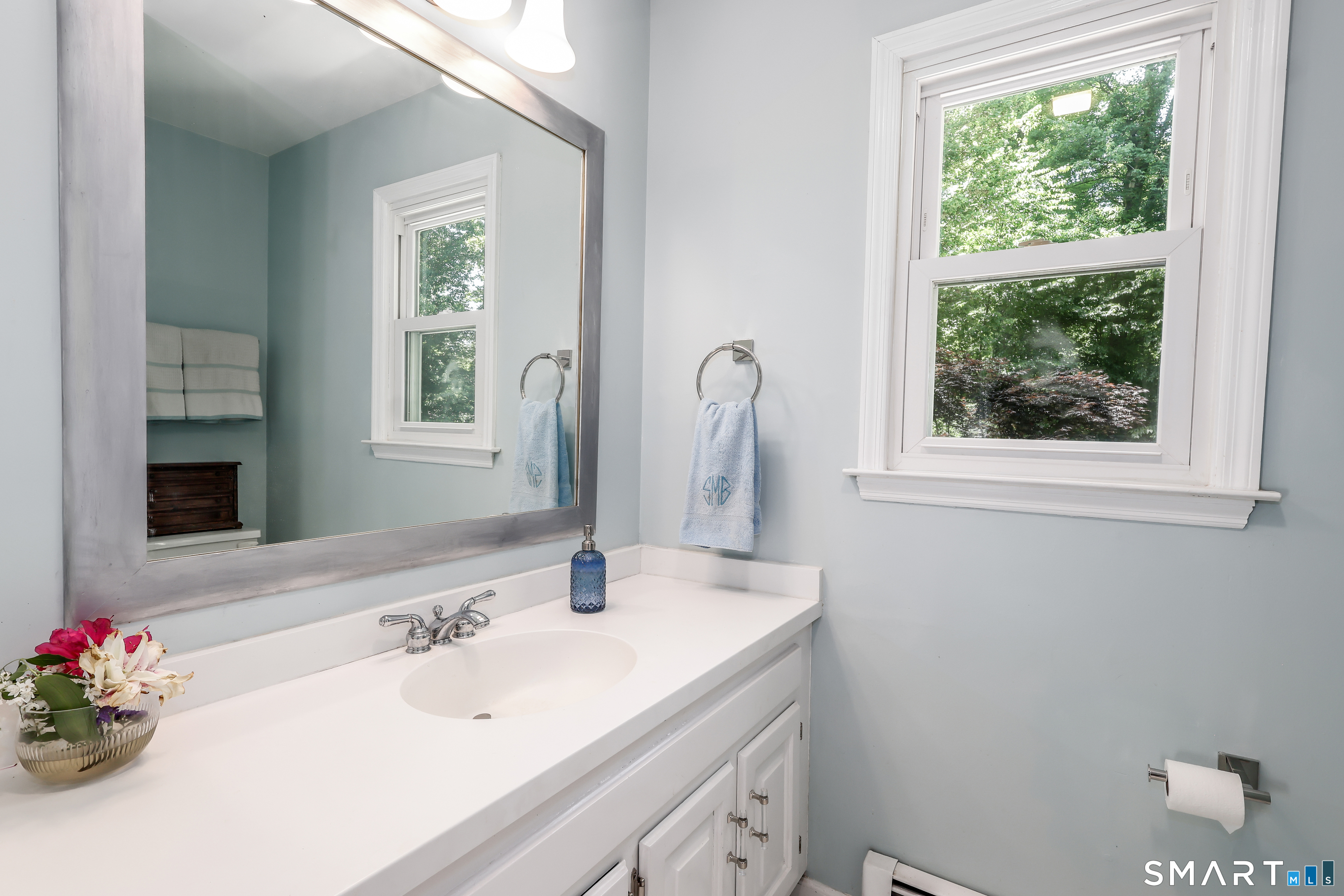 23 Old Green Road Newtown, CT 06482 - Photo 24 of 36 a bathroom with a sink vanity and a mirror