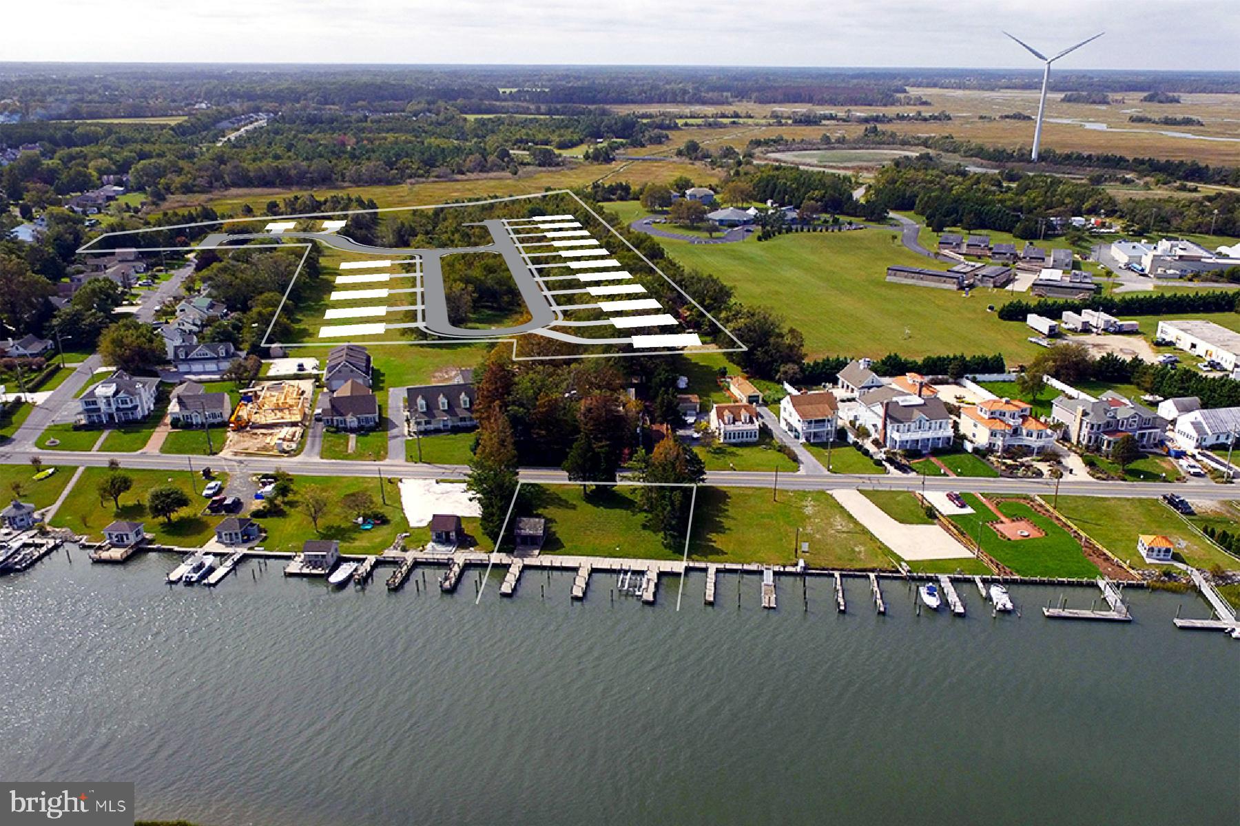 149 Jacks Way, Unit 18 Lewes, DE 19958 - Photo 7 of 26 an aerial view of residential houses with outdoor space