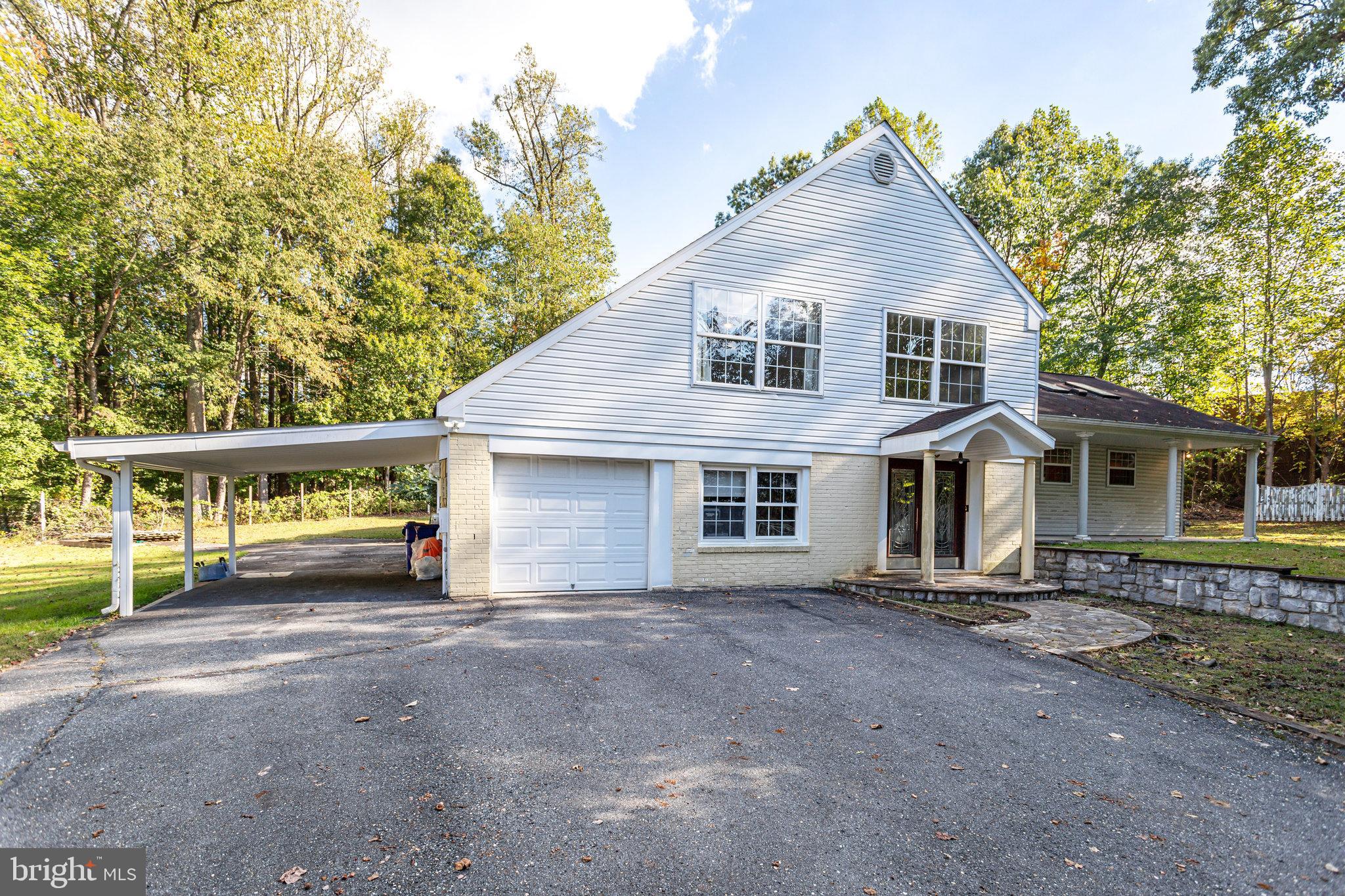 a front view of a house with yard