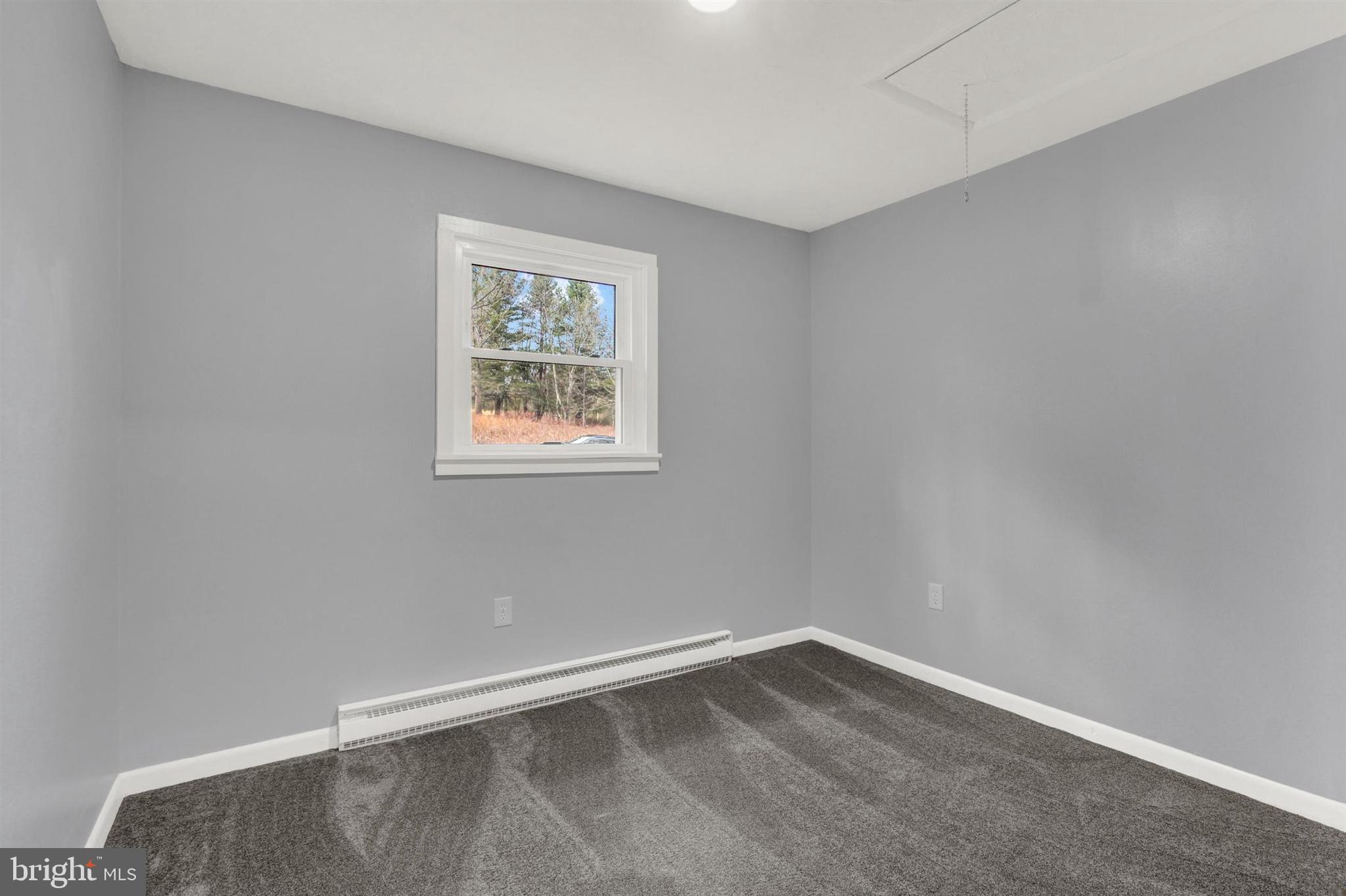 203 Pebble Lane Biglerville, PA 17307 - Photo 19 of 29 a view of an empty room with a window