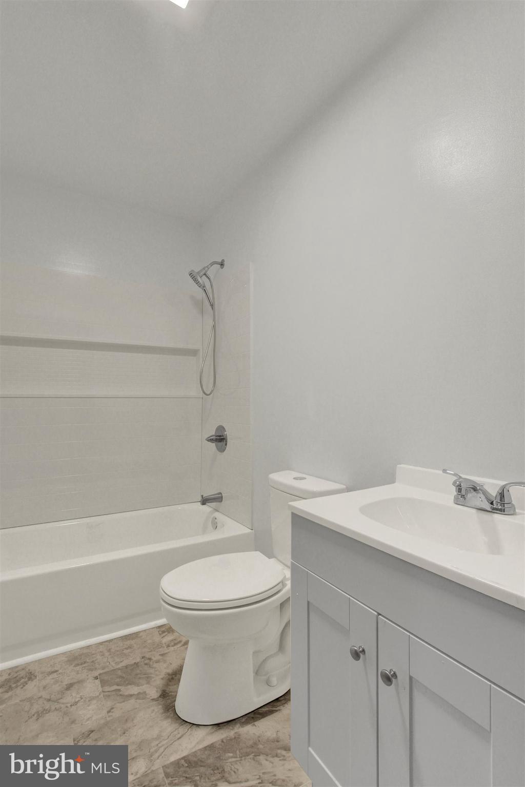 203 Pebble Lane Biglerville, PA 17307 - Photo 20 of 29 a bathroom with a sink a toilet and shower