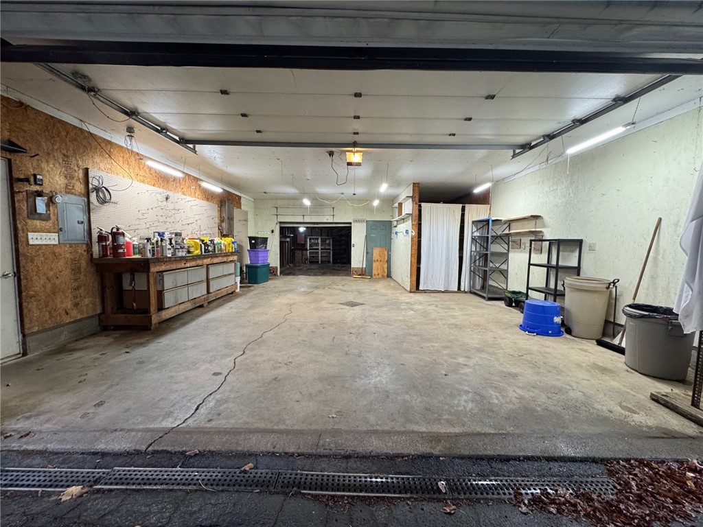 215 Pithole Road Cyclone, PA 16726 - Photo 30 of 41 Garage interior with workshop