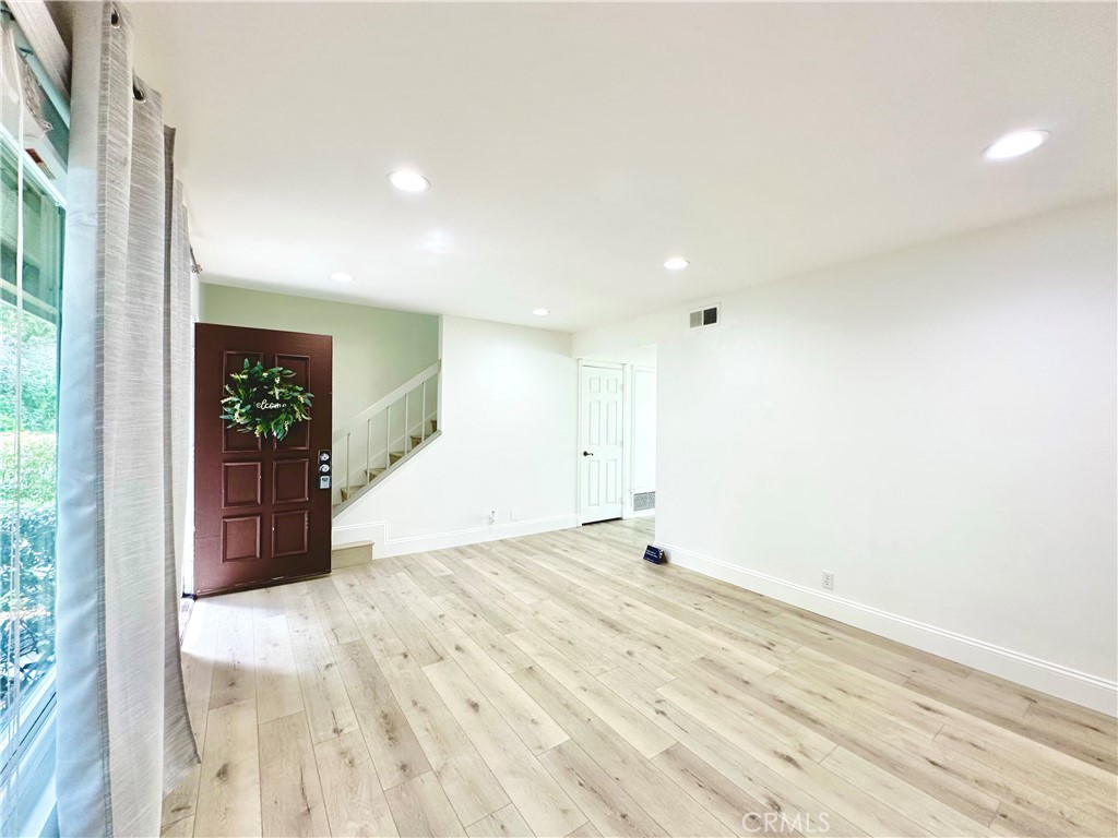 13 Greenleaf, Unit 5 Irvine, CA 92604 - Photo 4 of 30 a view of an empty room