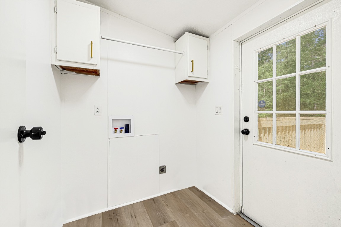 16315 Lone Star Ranch Drive Conroe, TX 77302 - Photo 14 of 20 a view of a storage & utility room with a window