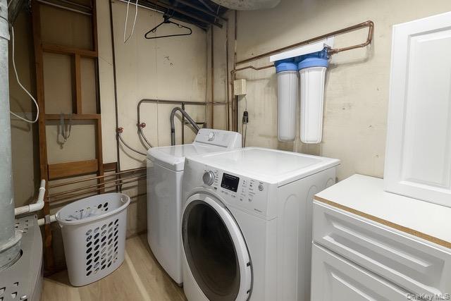 6 Adele Boulevard Spring Valley, NY 10977 - Photo 14 of 16 a utility room with dryer and washer